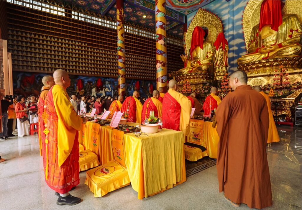 Monk performing a blessing ceremony in a Chinese temple
