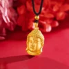 Gold Buddha Head Pendant on Black Braided Cord Necklace on red background
