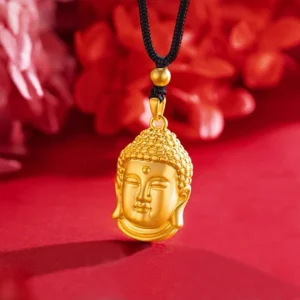 Gold Buddha Head Pendant on Black Braided Cord Necklace on red background