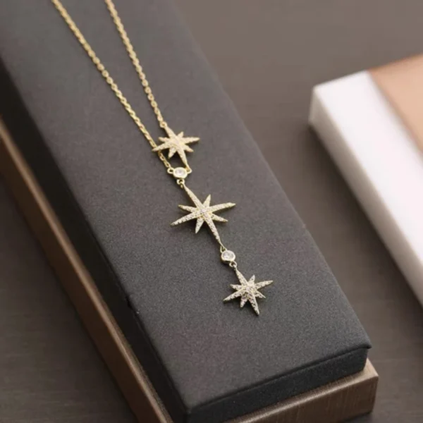 Titanium steel eight-pointed star necklace, snowflake crystal pendant, adjustable tassel collarbone chain, fade-proof women’s jewelry, JIN BAI ZHENG brand, hypoallergenic necklace, light luxury accessory, celestial-inspired design, versatile daily wear, holiday gift idea, sustainable materials, affordable elegance, artisan crafted, positive energy jewelry, modern feminine style, special occasion necklace, winter-themed jewelry, holistic wellness accessory, elegant packaging.