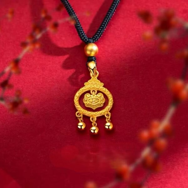 Close-up of Detailed Golden Lucky Lock Pendant on Red Background