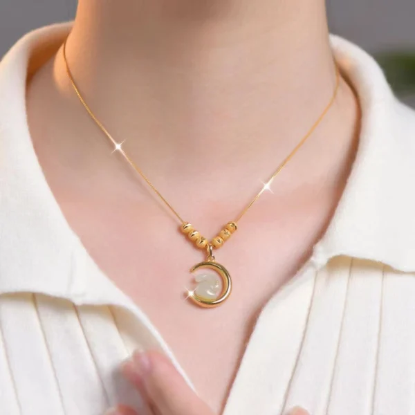 New titanium steel necklace, exquisite six-blessings moon-rabbit pendant, anti-tarnish collarbone chain, luxury zodiac year jewelry, fashionable women's accessory, hypoallergenic necklace, symbolic gift idea, lightweight daily wear, affordable luxury, sustainable materials, artisan crafted, positive energy accessory, modern feminine style, cultural inspired design, special occasion gift, holistic wellness jewelry, versatile lock-chain, elegant packaging.