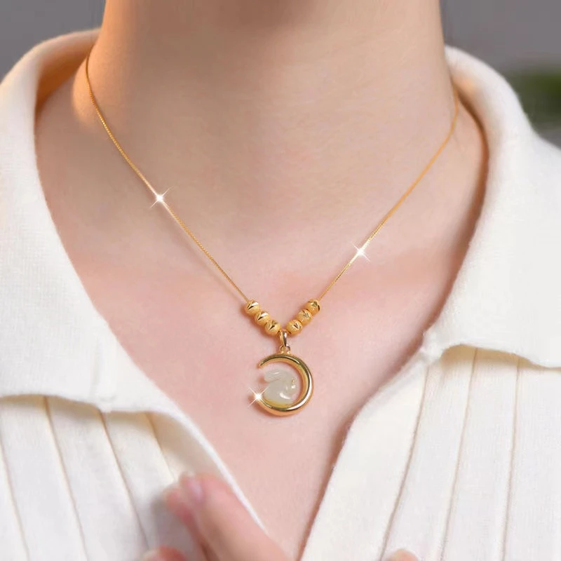 New titanium steel necklace, exquisite six-blessings moon-rabbit pendant, anti-tarnish collarbone chain, luxury zodiac year jewelry, fashionable women's accessory, hypoallergenic necklace, symbolic gift idea, lightweight daily wear, affordable luxury, sustainable materials, artisan crafted, positive energy accessory, modern feminine style, cultural inspired design, special occasion gift, holistic wellness jewelry, versatile lock-chain, elegant packaging.