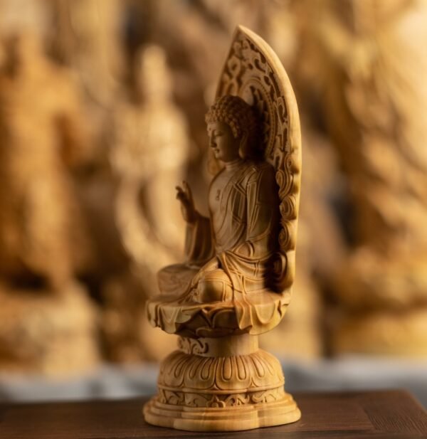 Boxwood Buddha statue, Vairocana Buddha carving, small-leaved boxwood sculpture, handcrafted Buddhist decor, spiritual altar statue, Sakyamuni wood carving, home meditation altar, traditional wood art, enlightenment statue, Buddhist gift idea, carved lotus throne, cosmic wisdom symbol, artisan wood sculpture, religious art collectible, Zen home decor, mindful living accessory, temple-quality statue, ethical craftsmanship, cultural heritage art, spiritual wellness products.