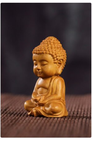 Huangyang wood Buddha statue, baby Sakyamuni carving, miniature desktop altar, handcrafted meditation ornament, small wooden Buddha statue, spiritual desk decor, Buddhist gift idea, sustainable wood carving, artisan crafted statue, mindfulness tool, traditional Buddhist art, compact altar statue, eco-friendly spiritual product, baby Buddha symbolism, pure enlightenment statue, wood grain artistry, Zen inspiration decor, collectible religious art, ethical sourcing sculpture, peaceful meditation aid.
