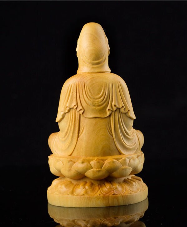 Small-leaved boxwood Guanyin statue, hand-carved Buddhist sculpture, 10cm lotus throne statue, altar meditation statue, traditional wood carving art, Guanyin Bodhisattva idol, eco-friendly spiritual decor, compassionate Bodhisattva statue, Buddhist gift idea, home temple accessory, mindfulness meditation tool, cultural art collection, artisan crafted statue, sustainable wood material, detailed lotus throne, serene expression carving, compact religious statue, spiritual mindfulness gift, Zen inspiration decor, ethical sourcing sculpture.