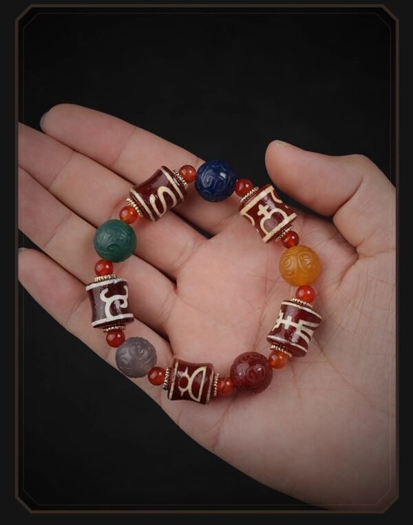 Five-element bracelet, agate dzi bead bracelet, energy balance jewelry, Tibetan blessed bracelet, unisex spiritual bracelet, metal wood water fire earth energies, sacred symbol bracelet, holistic healing jewelry, mindfulness accessory, natural stone bracelet, adjustable spiritual bracelet, multicolor agate beads, protection talisman, meditation bracelet, cultural gift idea, zodiac energy balance, traditional Tibetan jewelry, metaphysical jewelry, daily wellness accessory, meaningful unisex gift.