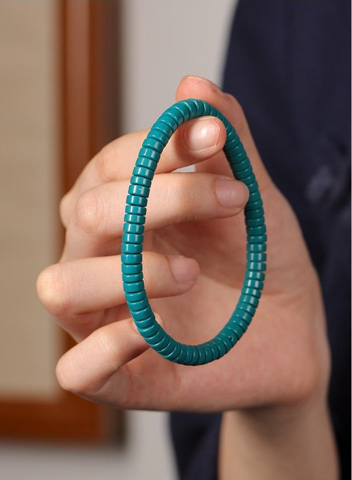 High-porcelain turquoise bracelet, natural turquoise prayer beads, minimalist Buddhist jewelry, 108-bead meditation strand, jade-like turquoise beads, plain turquoise bracelet, spiritual meditation accessory, handmade turquoise beads, calming energy bracelet, sustainable mineral jewelry, Zen meditation beads, unisex spiritual gift, knotting prayer bracelet, ethical turquoise sourcing, luxury minimalist design, mindfulness practice tool, natural stone prayer beads, elegant simplicity bracelet, turquoise healing properties, classic Buddhist accessory.
