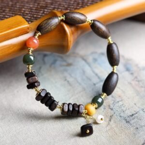 Dalargan agarwood bracelet, 8-16mm natural wood beads, New Chinese style jewelry, minimalist spiritual bracelet, meditation aromatherapy beads, sustainable agarwood accessory, earthy fragrance bracelet, organic sized beads, modern Chinese design, therapeutic scent jewelry, daily mindfulness bracelet, resin-rich agarwood, artisan crafted mala, versatile spiritual wear, holistic wellness accessory, ethical sourcing bracelet, cultural inspired jewelry, lightweight prayer beads, gender-neutral spiritual gift, natural grain variations.