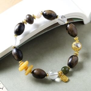 10mm white crystal agarwood bracelet, natural crystal and wood jewelry, purifying energy bracelet, meditation balance accessory, spiritual grounding jewelry, alternating bead design, sustainable spiritual wear, calming aroma beads, holistic healing bracelet, handcrafted mala alternative, positive energy flow jewelry, earthy fragrance beads, daily mindfulness accessory, ethical sourcing bracelet, crystal purification properties, agarwood calming benefits, gender-neutral spiritual gift, eco-friendly materials, artisan crafted bracelet, versatile meditation tool.