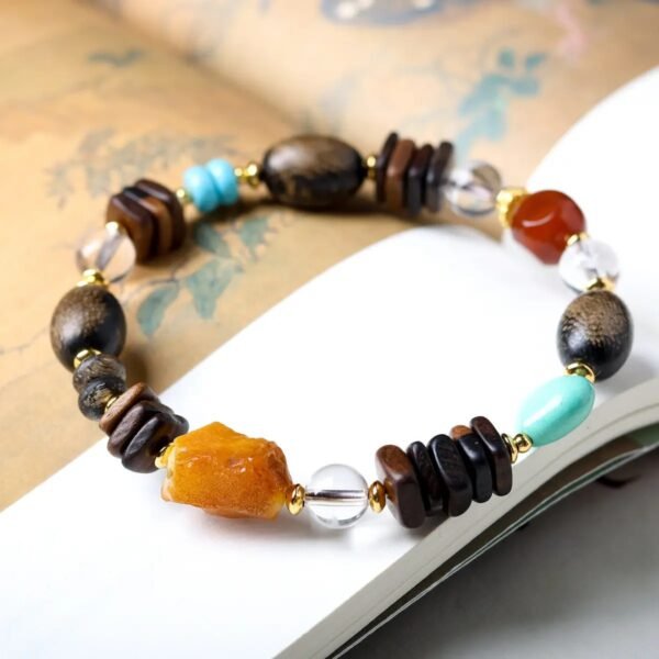 8mm Dalargan agarwood bracelet, Chinese-style mala beads, cultural spirituality bracelet, meditation agarwood beads, traditional Chinese design, ethical agarwood sourcing, aromatic therapy bracelet, minimalist spiritual jewelry, handmade mala bracelet, calming fragrance beads, holistic wellness accessory, gender-neutral cultural gift, eco-friendly materials, resin-rich agarwood, daily mindfulness tool, artisan crafted bracelet, grounding energy jewelry, sustainable spiritual wear, oriental inspired jewelry, natural grain variations.