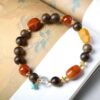 9mm Green Qinan agarwood bracelet, premium prayer beads, luxury meditation mala, cooling sweet aroma beads, high-resin agarwood jewelry, spiritual aromatherapy bracelet, ethically sourced agarwood, 108-bead mala, Buddhist prayer beads, rare Green Qinan wood, artisan crafted mala, holistic wellness accessory, calming fragrance bracelet, sustainable spiritual jewelry, elite meditation tool, floral-earthy scent beads, traditional knotting technique, gender-neutral spiritual gift, natural resin patterns, daily mindfulness bracelet.