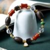 10mm white crystal bracelet, bug-hole agarwood jewelry, natural chénxiāng bracelet, spiritual healing bracelet, red agate and jade accessories, gold-accented beaded bracelet, handmade crystal agarwood combo, meditation energy jewelry, elastic stretch bracelet, white jade heart charm, holistic balance jewelry, Eastern-inspired accessories, aromatic agarwood beads, protection and clarity bracelet, luxury spiritual gift, natural resin-rich agarwood, artisan beaded design, daily mindfulness jewelry, ethical sourcing bracelet, multidimensional beaded bracelet.