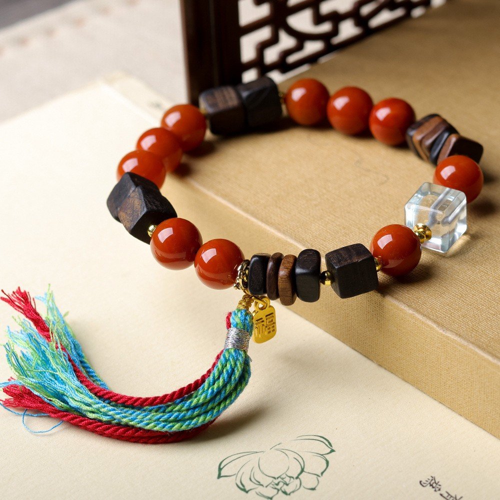 10mm agarwood bracelet, South red agate jewelry, natural bead bracelet, spiritual meditation accessory, handmade bohemian bracelet, crystal and turquoise accents, gold-toned tassel design, ethical sourcing, aromatic therapy bracelet, elastic-free knotting, daily mindfulness jewelry, holistic wellness gift, versatile layering piece, eco-friendly materials, cultural symbolism, positive energy accessory, artisan crafted, unique grain variations, luxury spiritual wear, gift for her.Temple consecration, house blessing, feng shui remedies, house pacification ceremonies, monk blessings, protective amulets, peace talismans, safety and peace assurance, wealth-invoking ceremonies, wealth deity statues, wealth-gathering formations, consecrated pi xiu (mythical creature), prayers and blessings, making vows, cultivating merit, peace and safety, imbuing objects with spiritual energy, infusing positive energy through sutra recitation, blessings, chanting mantras and dharani, liberation of deceased spirits, rebirth in the Pure Land, accumulating merit, nurturing compassion, devotional repentance, eliminating karmic obstacles, Buddha, Dharma, Sangha, portable guardian objects, peace-ensuring talismans, warding off evil spirits, neutralizing negative energies, averting disasters, deflecting misfortunes, Taiji and Bagua symbols. Buddhas: Dipamkara Buddha, Shakyamuni Buddha, Maitreya Buddha, Amitabha Buddha, Medicine Buddha, Akshobhya Buddha, Ratnasambhava Buddha, Amoghasiddhi Buddha, Five Dhyani Buddhas, Prabhutaratna Buddha. Bodhisattvas: Avalokiteshvara Bodhisattva, Manjushri Bodhisattva, Samantabhadra Bodhisattva, Ksitigarbha Bodhisattva, Mahasthamaprapta Bodhisattva, Guanyin, Wenshu, Puxian, Dizang, Maitreya, Akashagarbha, Vajrapani, Sarvanivarana-Vishkambhin. 