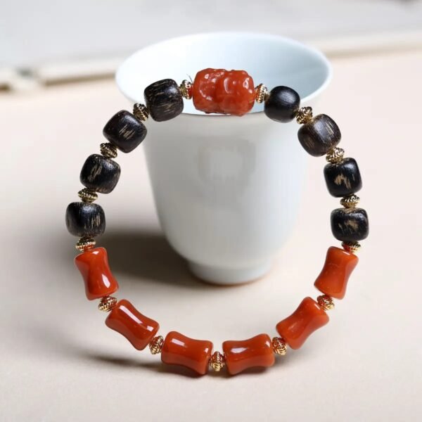 8mm bug-leak Nanhong bracelet, bamboo-joint agate beads, red and black contrast jewelry, natural Nanhong agate bracelet, spiritual elegance accessory, unique cultural bracelet, handmade agate jewelry, daily wear spiritual beads, symbolic resilience bracelet, artistic bamboo design, eco-friendly jewelry, minimalist agate bracelet, gift for spiritual seekers, traditional inspired accessory, balanced energy jewelry, natural texture beads, versatile agate bracelet, ethical sourcing jewelry, mindful living accessory, cultural art bracelet.