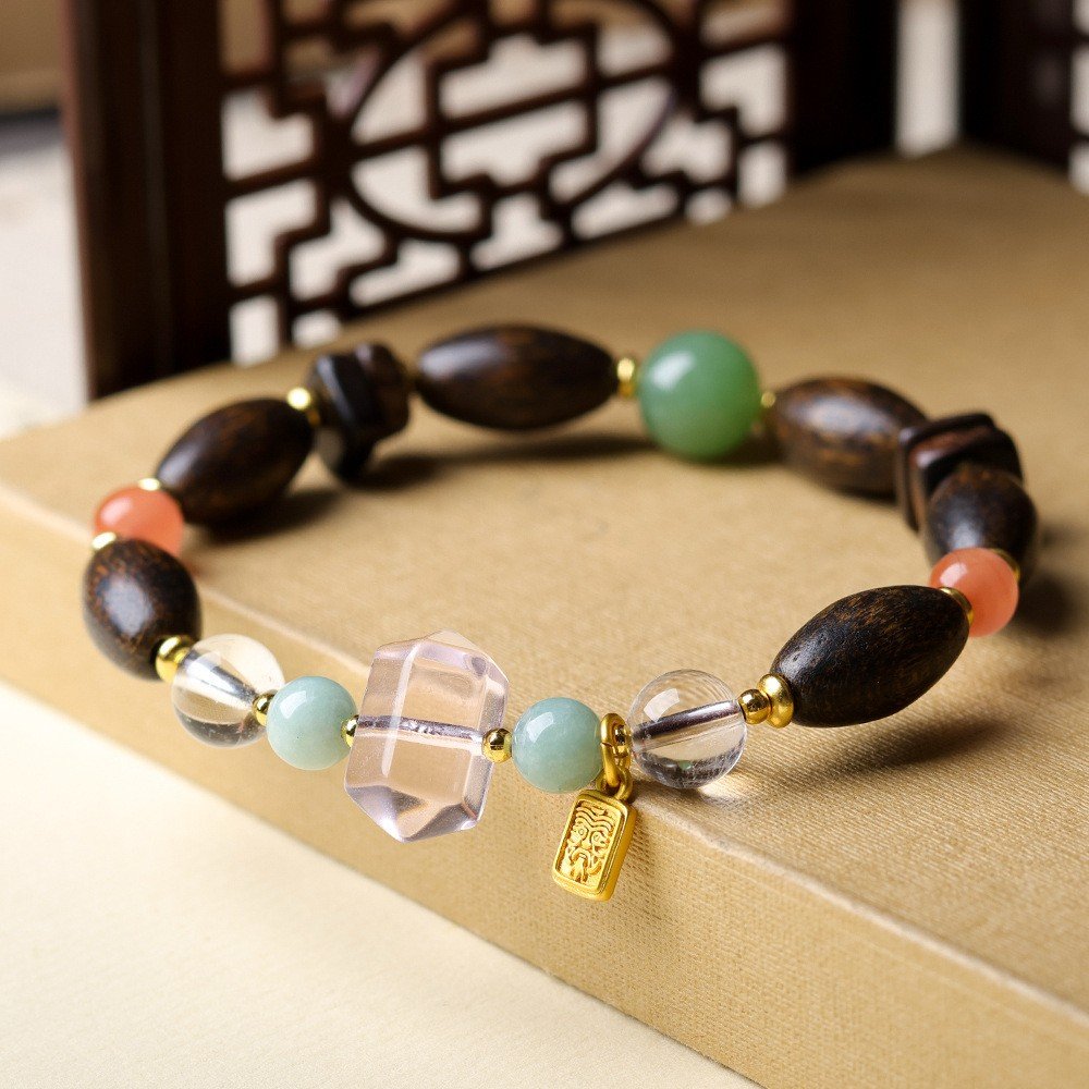15x13mm agarwood bracelet, white crystal diamond jewelry, luxury spiritual bracelet, energy cleansing accessory, cubic zirconia accents, gold-toned spacer design, handmade meditation beads, ethical agarwood sourcing, holistic healing jewelry, substantial bead size, elegant spiritual gift, artisan crafted mala, modern mindfulness accessory, positive energy amplification, eco-friendly materials, versatile statement piece, crystal purification bracelet, diamond-like brilliance, grounding aroma therapy, luxury wellness jewelry.Temple consecration, house blessing, feng shui remedies, house pacification ceremonies, monk blessings, protective amulets, peace talismans, safety and peace assurance, wealth-invoking ceremonies, wealth deity statues, wealth-gathering formations, consecrated pi xiu (mythical creature), prayers and blessings, making vows, cultivating merit, peace and safety, imbuing objects with spiritual energy, infusing positive energy through sutra recitation, blessings, chanting mantras and dharani, liberation of deceased spirits, rebirth in the Pure Land, accumulating merit, nurturing compassion, devotional repentance, eliminating karmic obstacles, Buddha, Dharma, Sangha, portable guardian objects, peace-ensuring talismans, warding off evil spirits, neutralizing negative energies, averting disasters, deflecting misfortunes, Taiji and Bagua symbols. Buddhas: Dipamkara Buddha, Shakyamuni Buddha, Maitreya Buddha, Amitabha Buddha, Medicine Buddha, Akshobhya Buddha, Ratnasambhava Buddha, Amoghasiddhi Buddha, Five Dhyani Buddhas, Prabhutaratna Buddha. Bodhisattvas: Avalokiteshvara Bodhisattva, Manjushri Bodhisattva, Samantabhadra Bodhisattva, Ksitigarbha Bodhisattva, Mahasthamaprapta Bodhisattva, Guanyin, Wenshu, Puxian, Dizang, Maitreya, Akashagarbha, Vajrapani, Sarvanivarana-Vishkambhin. 