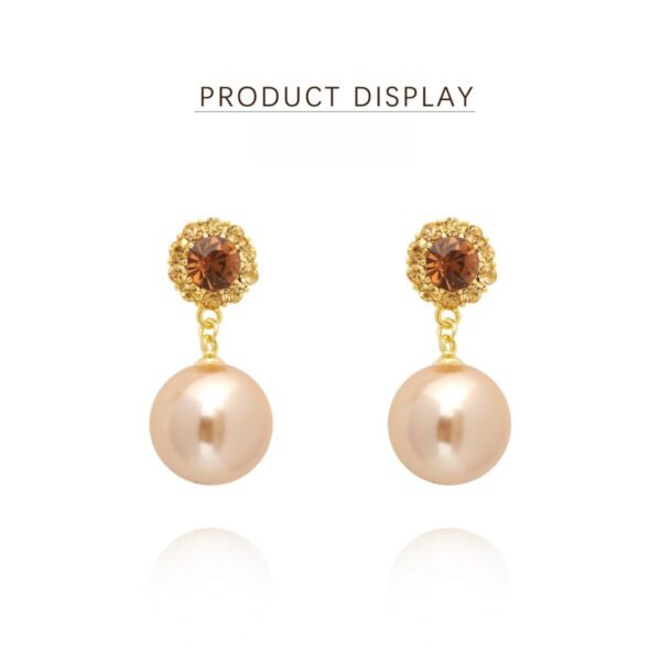 Qintang copper alloy earrings, light luxury floral earrings, crystal and pearl jewelry, versatile elegant earrings, brown crystal accents, hypoallergenic pearl earrings, gold-toned fashion accessories, gift for her, daily wear elegance, formal occasion earrings, affordable luxury jewelry, classic modern design, secure clutch earrings, tarnish-resistant earrings, sophisticated women's accessories, floral-inspired jewelry, pearl pendant earrings, wardrobe staple earrings, romantic style earrings, crystal-inlaid design.