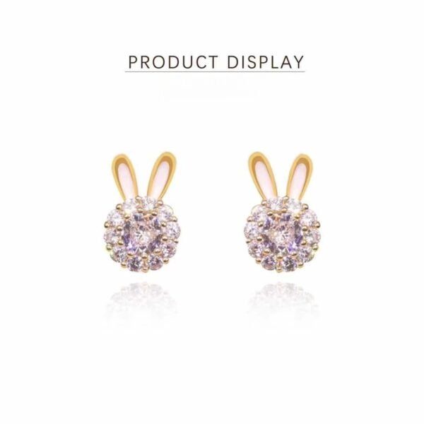 Lucky rabbit earrings, copper alloy jewelry, light luxury earrings, versatile fashion accessories, hypoallergenic earrings for women, symbolic animal earrings, minimalist elegant earrings, rhodium plated earrings, lightweight everyday earrings, gift for her, trendy animal motif, affordable luxury jewelry, sensitive ears safe, layered earring style, prosperity symbolism, fashion statement earrings, durable coated jewelry, office to evening wear, cultural symbolism earrings, rabbit-themed accessories.