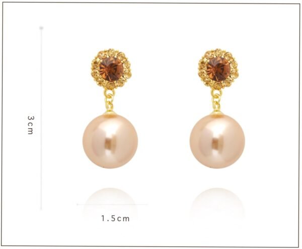 Qintang copper alloy earrings, light luxury floral earrings, crystal and pearl jewelry, versatile elegant earrings, brown crystal accents, hypoallergenic pearl earrings, gold-toned fashion accessories, gift for her, daily wear elegance, formal occasion earrings, affordable luxury jewelry, classic modern design, secure clutch earrings, tarnish-resistant earrings, sophisticated women's accessories, floral-inspired jewelry, pearl pendant earrings, wardrobe staple earrings, romantic style earrings, crystal-inlaid design.