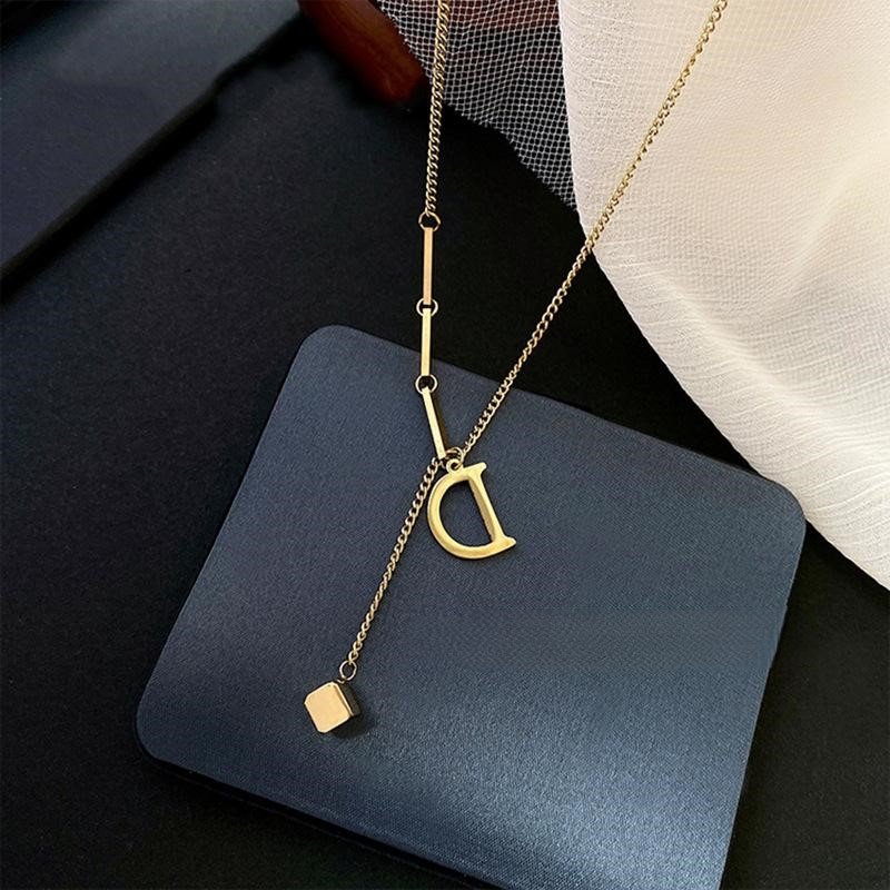 Titanium steel letter D necklace, Korean style tassel chain, adjustable 40+5cm lock-neck jewelry, fade-proof collarbone accessory, JIN BAI ZHENG brand, hypoallergenic women's necklace, versatile daily wear, minimalist gift idea, sustainable materials, affordable luxury, artisan crafted, positive energy accessory, modern feminine style, special occasion gift, holistic wellness jewelry, cultural inspired design, elegant packaging.