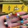 Lingyin Temple blessed bracelet, 18-seed Buddhist mala, spiritual protection bracelet, natural seed prayer beads, good luck bracelet, Buddhist meditation accessories, eco-friendly spiritual jewelry, handmade mala bracelet, Zen lifestyle product, meaningful cultural gift, positive energy bracelet, ancient Buddhist tradition, sustainable jewelry, mindfulness practice tool, sacred Buddhist beads, adjustable prayer bracelet, Luckin Temple souvenir, spiritual grounding bracelet, unisex spiritual accessory, daily mindfulness bracelet.