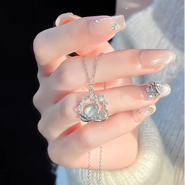 Titanium steel galaxy necklace, women's celestial jewelry, light luxury collarbone chain, cubic zirconia pendant, white gold finish necklace, minimalist fashion accessory, hypoallergenic necklace, niche design jewelry, adjustable chain necklace, gift for her, sustainable materials, affordable luxury, artisan crafted, positive energy jewelry, cosmic inspiration, versatile daily wear, elegant gift idea, JUSONG KLEIN brand, modern minimalist style.