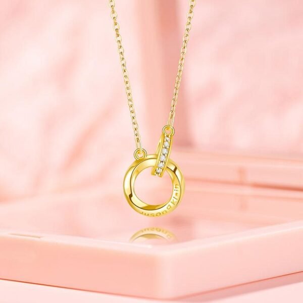 Titanium steel Mobius necklace, double-ring necklace, gold-plated chain, cubic zirconia jewelry, light luxury women's necklace, adjustable lock necklace, JUSONG KLEIN brand, hypoallergenic necklace, symbolic infinity jewelry, versatile daily wear, minimalist design, elegant gift for her, sustainable materials, affordable luxury, artisan crafted, positive energy accessory, modern feminine style, special occasion gift, holistic wellness jewelry, niche fashion accessory.