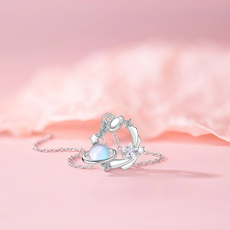 Titanium steel blue dream planet necklace, light luxury celestial pendant, adjustable collarbone chain, synthetic cubic zirconia jewelry, white gold finish necklace, women's fashion necklace, JUSONG KLEIN brand, hypoallergenic necklace, cosmic-themed accessory, gift for her, sustainable materials, affordable luxury, artisan crafted, versatile daily wear, elegant gift idea, modern minimalist style, positive energy jewelry, cultural inspired design, holistic wellness accessory, special occasion gift.