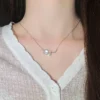 Titanium steel tulip necklace, women's floral collarbone chain, light luxury jewelry, sparkling accent pendant, hypoallergenic necklace, adjustable chain necklace, 2.5cm floral pendant, elegant gift for her, versatile daily necklace, nature-inspired jewelry, affordable luxury accessory, minimalist floral design, sustainable materials, bohemian chic style, holistic wellness accessory, cultural inspired design, artisan crafted, positive energy jewelry, unique niche jewelry, modern femininity.