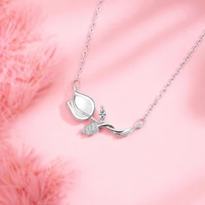 Titanium steel tulip necklace, women's floral collarbone chain, light luxury jewelry, sparkling accent pendant, hypoallergenic necklace, adjustable chain necklace, 2.5cm floral pendant, elegant gift for her, versatile daily necklace, nature-inspired jewelry, affordable luxury accessory, minimalist floral design, sustainable materials, bohemian chic style, holistic wellness accessory, cultural inspired design, artisan crafted, positive energy jewelry, unique niche jewelry, modern femininity.