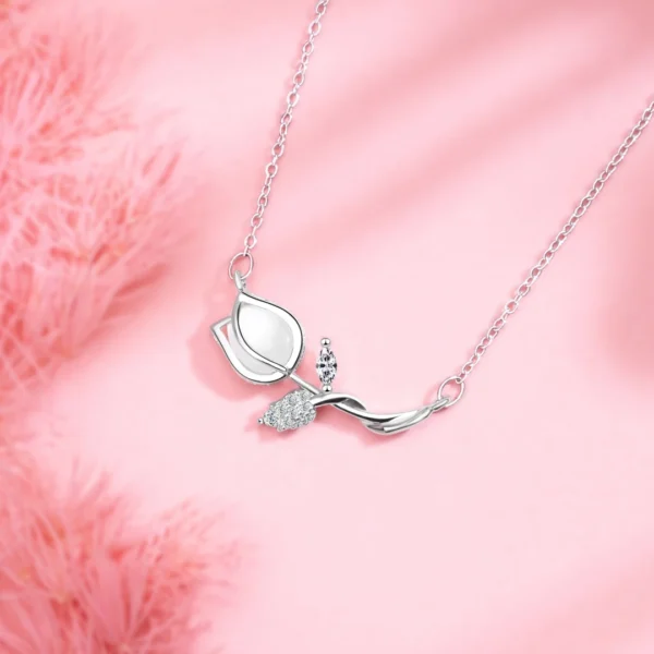 Titanium steel tulip necklace, women's floral collarbone chain, light luxury jewelry, sparkling accent pendant, hypoallergenic necklace, adjustable chain necklace, 2.5cm floral pendant, elegant gift for her, versatile daily necklace, nature-inspired jewelry, affordable luxury accessory, minimalist floral design, sustainable materials, bohemian chic style, holistic wellness accessory, cultural inspired design, artisan crafted, positive energy jewelry, unique niche jewelry, modern femininity.