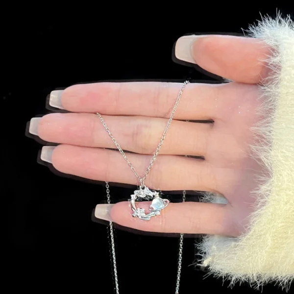 Titanium steel blue dream planet necklace, light luxury celestial pendant, adjustable collarbone chain, synthetic cubic zirconia jewelry, white gold finish necklace, women's fashion necklace, JUSONG KLEIN brand, hypoallergenic necklace, cosmic-themed accessory, gift for her, sustainable materials, affordable luxury, artisan crafted, versatile daily wear, elegant gift idea, modern minimalist style, positive energy jewelry, cultural inspired design, holistic wellness accessory, special occasion gift.