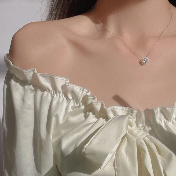 Titanium steel sugar cube necklace, JUSONG KLEIN jewelry, minimalist collarbone chain, cubic zirconia pendant, light luxury fashion necklace, women's minimalist jewelry, silver tone necklace, hypoallergenic necklace, tarnish-resistant accessory, affordable luxury jewelry, versatile daily wear necklace, niche design jewelry, elegant gift for her, modern minimalist style, sustainable materials, bohemian chic accessory, holistic wellness jewelry, cultural inspired design, artisan crafted, positive energy accessory.