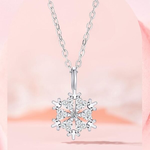 Winter snowflake necklace, titanium steel collarbone chain, cubic zirconia pendant, light luxury jewelry for women, hypoallergenic necklace, adjustable chain necklace, white gold electroplated jewelry, minimalist winter accessory, holiday gift idea, JUSONG KLEIN brand, sustainable fashion, artisan crafted, versatile daily wear, symbolic snowflake design, affordable luxury, elegant gift for her, modern minimalist style, seasonal jewelry, positive energy accessory, cultural inspired design.