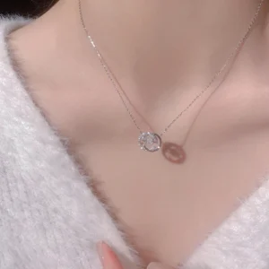 Titanium steel double C-circle necklace, JUSONG KLEIN jewelry, light luxury collarbone chain, cubic zirconia pendant, adjustable necklace for women, minimalist silver necklace, hypoallergenic jewelry, tarnish-resistant accessory, small-batch design, versatile daily wear, sparkling zirconia necklace, modern elegance, gift for her, sustainable materials, niche fashion jewelry, artisan crafted, positive energy accessory, cultural inspired design, holistic wellness jewelry, affordable luxury.2/2