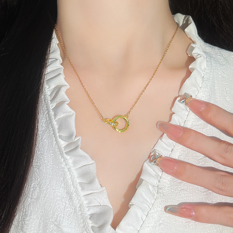 Titanium steel Mobius necklace, double-ring necklace, gold-plated chain, cubic zirconia jewelry, light luxury women's necklace, adjustable lock necklace, JUSONG KLEIN brand, hypoallergenic necklace, symbolic infinity jewelry, versatile daily wear, minimalist design, elegant gift for her, sustainable materials, affordable luxury, artisan crafted, positive energy accessory, modern feminine style, special occasion gift, holistic wellness jewelry, niche fashion accessory.