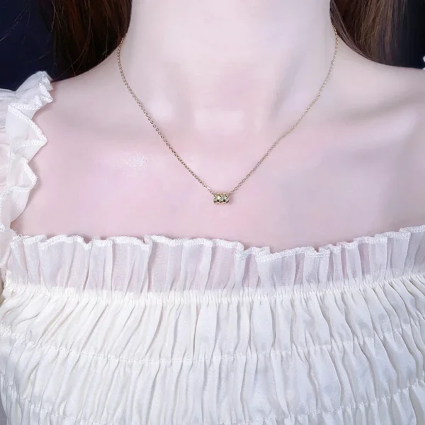 Titanium steel necklace, small waist pendant necklace, light luxury jewelry for women, minimalist collarbone chain, cubic zirconia accent necklace, gold plated necklace, versatile daily necklace, niche design jewelry, hypoallergenic fashion accessory, adjustable chain necklace, dainty jewelry, layering necklace, elegant gift for her, sustainable materials, affordable luxury, artisan crafted, positive energy jewelry, cultural inspired design, holistic wellness accessory, modern minimalist style.