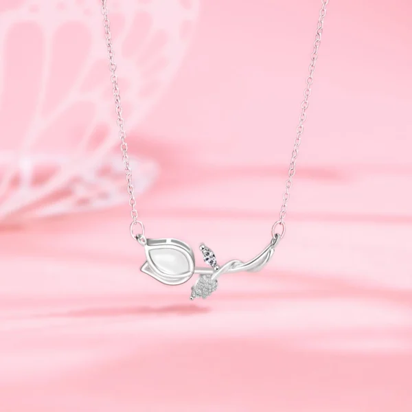 Titanium steel tulip necklace, women's floral collarbone chain, light luxury jewelry, sparkling accent pendant, hypoallergenic necklace, adjustable chain necklace, 2.5cm floral pendant, elegant gift for her, versatile daily necklace, nature-inspired jewelry, affordable luxury accessory, minimalist floral design, sustainable materials, bohemian chic style, holistic wellness accessory, cultural inspired design, artisan crafted, positive energy jewelry, unique niche jewelry, modern femininity.