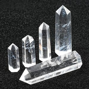 Clear quartz meditation crystals, energy healing stones, spiritual practice tools, geometric crystal set, chakra balancing crystals, Reiki healing tools, natural quartz points, mindfulness meditation accessories, altar decoration crystals, positive energy amplification, holistic wellness products, spiritual gift sets, crystal grid supplies, mental clarity tools, stress relief crystals, sacred geometry crystals, dark background aesthetic, polished crystal wands, intention manifestation tools, eco-friendly spiritual products.