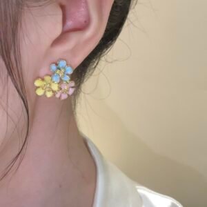 Copper alloy flower memory earrings, light luxury floral stud earrings, pastel multi-color jewelry, hypoallergenic earrings for women, lightweight dainty earrings, versatile fashion accessories, niche design earrings, elegant gift for her, anti-tarnish coating, bohemian chic earrings, stackable earrings, trendy 2024 jewelry, artistic floral cluster, sustainable materials, daily wear earrings, special occasion gifts, minimalist elegance, unique design earrings, affordable luxury, holistic wellness accessory.