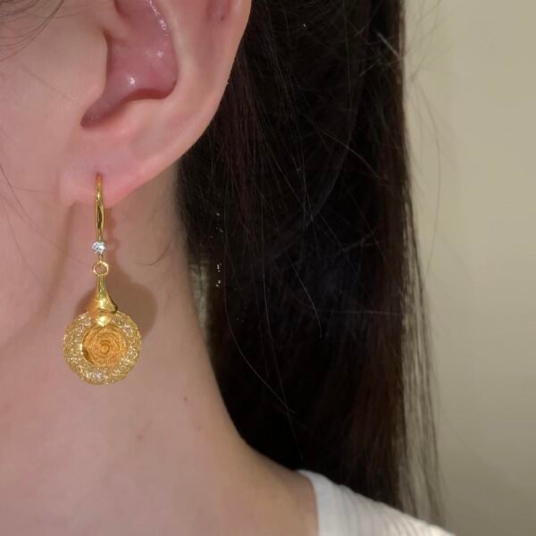 Yunguang copper-alloy earrings, rose pattern earrings, crystal-encrusted jewelry, light luxury fashion earrings, versatile gold-toned earrings, hypoallergenic romantic earrings, vintage-inspired accessories, gift for her, daily wear elegance, formal event jewelry, affordable luxury earrings, nickel-free earrings, tarnish-resistant design, secure clutch earrings, delicate rose motif, micro-crystal details, wardrobe staple earrings, sophisticated women's accessories, artistic design earrings, timeless elegance jewelry.