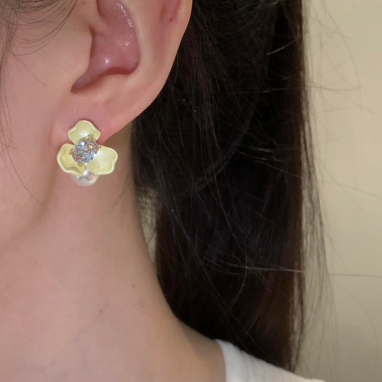 Copper-alloy floral earrings, Among the Blossoms earrings, light luxury jewelry, pearl accent earrings, versatile women's earrings, hypoallergenic earrings, gold-toned floral design, romantic earrings, elegant gift idea, fashion accessories, daily wear earrings, special occasion jewelry, affordable luxury, nickel-free earrings, tarnish-resistant jewelry, artistic design earrings, modern floral earrings, lightweight statement earrings, women's fashion gifts, blooming garden inspiration.