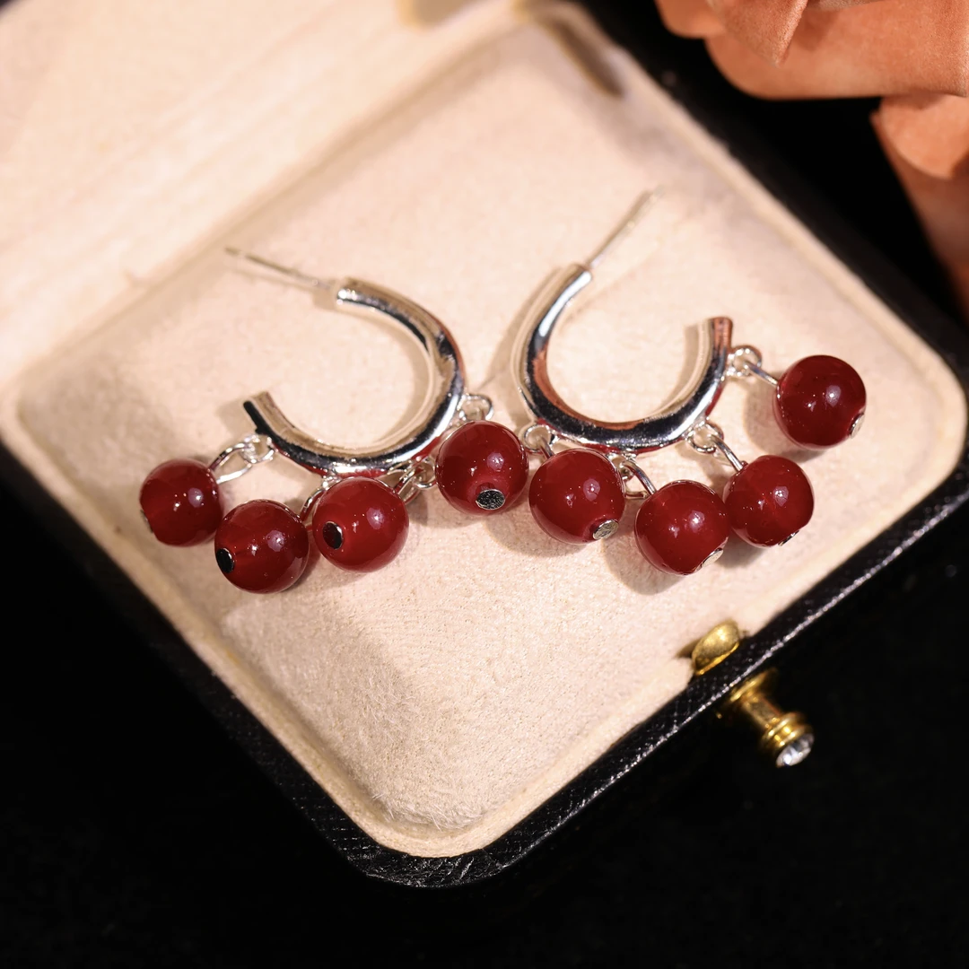 Copper-alloy cherry weave earrings, light luxury fashion earrings, versatile elegant earrings, advanced design ear accessories, hypoallergenic statement earrings, red accent jewelry, artistic inspired earrings, daily wear elegant earrings, sophisticated fashion jewelry, minimalist chic earrings, secure clutch earrings, nickel-free ear accessories, tarnish-resistant jewelry, gift for her, modern poetic design, affordable luxury earrings, unique weave pattern earrings, fashion-forward accessories, refined casual earrings, special occasion jewelry.