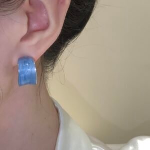 Blue ribbon earrings, copper alloy earrings with enamel, light luxury jewelry, unique blue earrings, versatile fashion earrings, hypoallergenic ear accessories, minimalist elegant earrings, niche design earrings, artistic jewelry, blue accent earrings, trendy earrings, gift for her, everyday luxury earrings, secure clutch earrings, vibrant color earrings, modern design earrings, affordable luxury, sensitive ears safe, stylish ear accessories, casual and formal earrings.