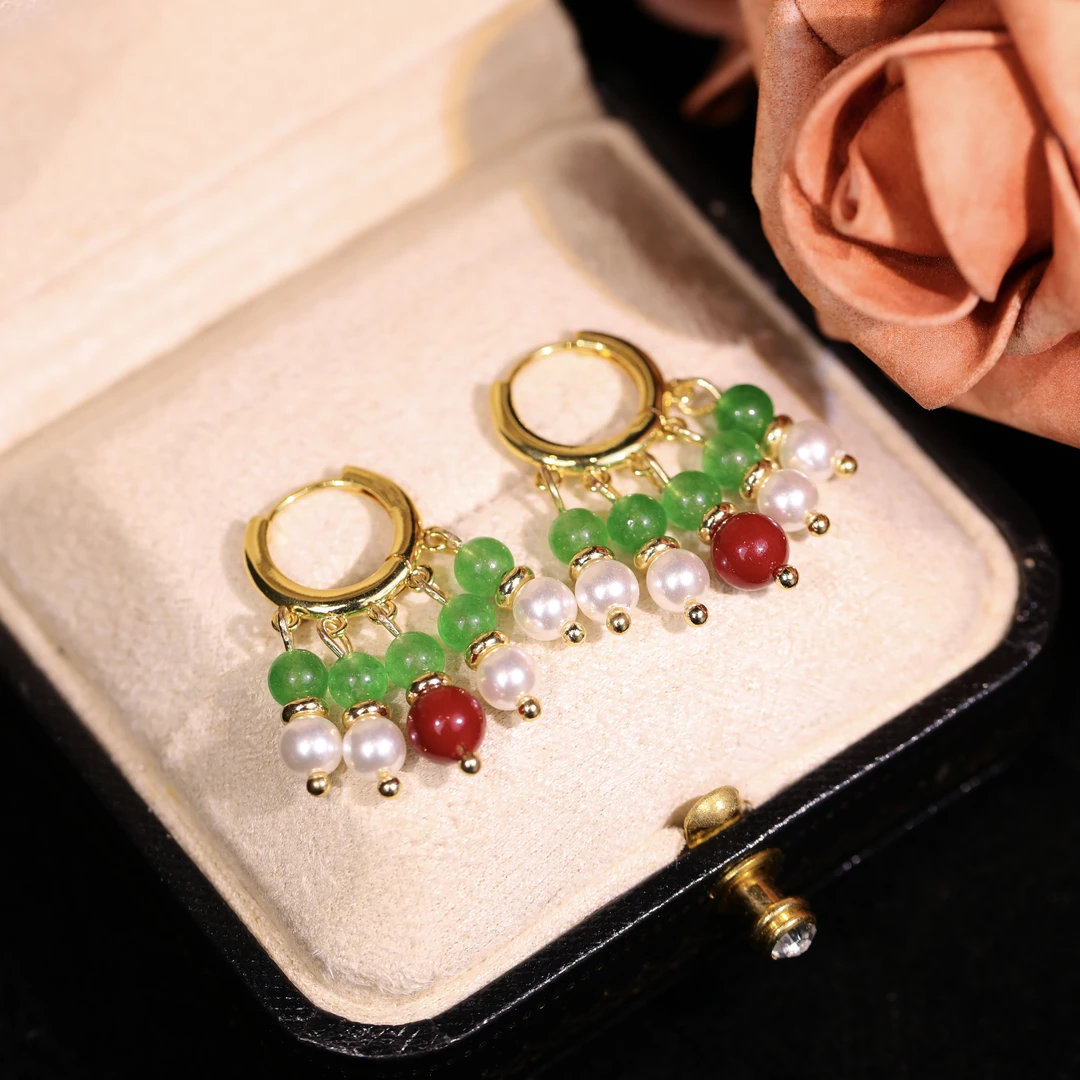 Birthday Wish earrings, copper-alloy light luxury jewelry, gemstone and pearl earrings, hypoallergenic gold-plated earrings, versatile fashion earrings, double-hoop design, gift for her, affordable luxury earrings, artistic elegance earrings, day-to-night accessory, secure clasp earrings, trendy yet timeless, minimalist chic earrings, cultural inspired jewelry, eco-friendly materials, sensitive ears safe, statement earrings, handmade design details, positive energy jewelry, birthday celebration gift.