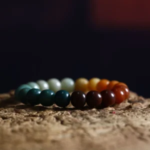Gradient Bodhi Bracelet on Paper with Chinese Characters