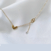 Gold-toned love heart necklace, titanium steel women's jewelry, double-sided pendant necklace, fade-proof adjustable chain, light luxury accessory, minimalist collarbone chain, hypoallergenic necklace, fashionable gift idea, versatile daily wear, sustainable materials, affordable elegance, artisan crafted, positive energy jewelry, modern feminine style, special occasion gift, holistic wellness accessory, cultural inspired design, elegant packaging.