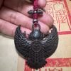 Tibetan thogcha iron pendant, Garuda protector amulet, celestial iron jewelry, traditional Tibetan craftsmanship, adjustable cord necklace, spiritual protection amulet, handmade ethnic jewelry, Buddhist symbolic pendant, cold iron thogcha artifact, Himalayan cultural accessory, antique finish pendant, negative energy ward, unisex spiritual gift, minimalist sacred design, ethical sourcing, holistic wellness jewelry, mystical Tibetan symbols, artisan crafted pendant, daily wear talisman, cultural heritage gift.