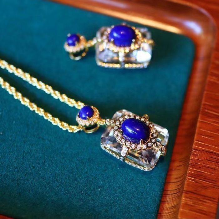 Natural lapis lazuli pendant, white crystal square necklace, S925 silver gold plated jewelry, handmade vintage necklace, luxury statement jewelry, hypoallergenic silver necklace, adjustable chain design, royal blue gemstone pendant, artisan crafted jewelry, versatile daily wear necklace, ethical sourcing, bohemian chic accessory, holistic wellness jewelry, cultural inspired elegance, affordable luxury, unique gift for her, modern classic style, special occasion jewelry, sustainable materials, timeless elegance.