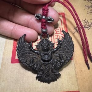 Tibetan thogcha iron pendant, Garuda protector amulet, celestial iron jewelry, traditional Tibetan craftsmanship, adjustable cord necklace, spiritual protection amulet, handmade ethnic jewelry, Buddhist symbolic pendant, cold iron thogcha artifact, Himalayan cultural accessory, antique finish pendant, negative energy ward, unisex spiritual gift, minimalist sacred design, ethical sourcing, holistic wellness jewelry, mystical Tibetan symbols, artisan crafted pendant, daily wear talisman, cultural heritage gift.